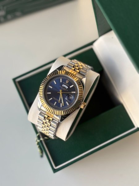 ساعة روليكس رجالية ارضية ازرق الهاردوير مكس بين الذهبي والسلفر