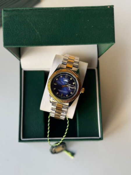 ساعة رولكس رجالي ارضية ازرق هاردوير مكس بين الذهبي والسلفر