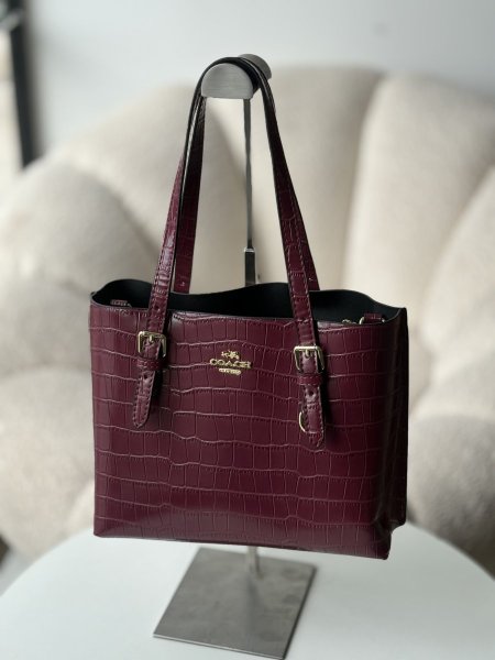 حقيبة كوتش لون برغندي