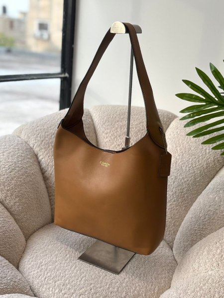 حقيبة كوتش  شامل كيس الشركة  الليذر ناعم وطري