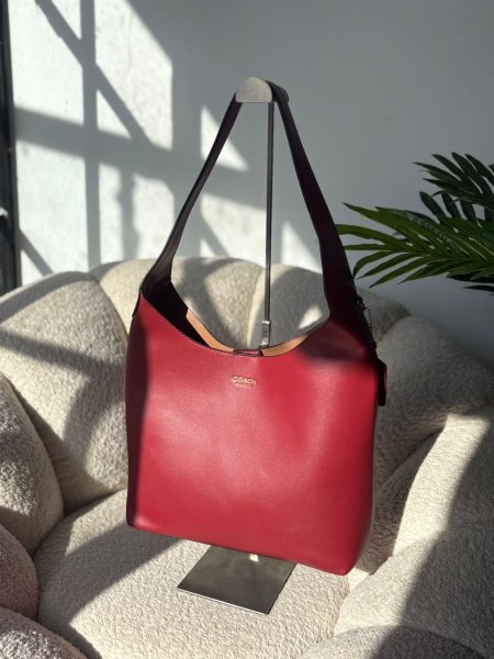 حقيبة كوتش لون برغندي