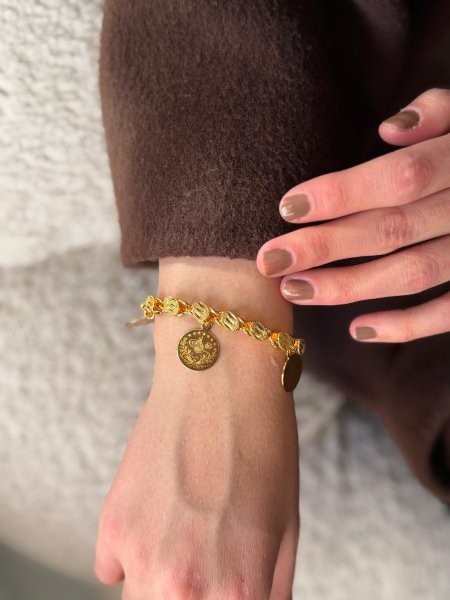 اسواره ليرات لون ذهبي مكفوله اللون