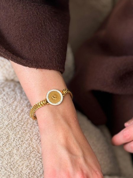 اسواره الليره لون ذهبي مكفوله اللون