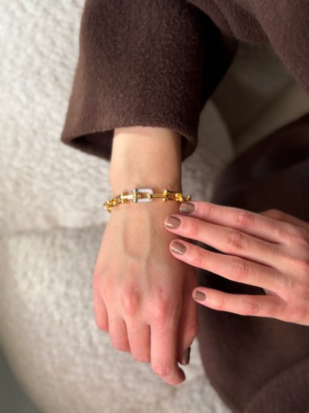 اسواره تيفاني لون ذهبي مكفوله اللون