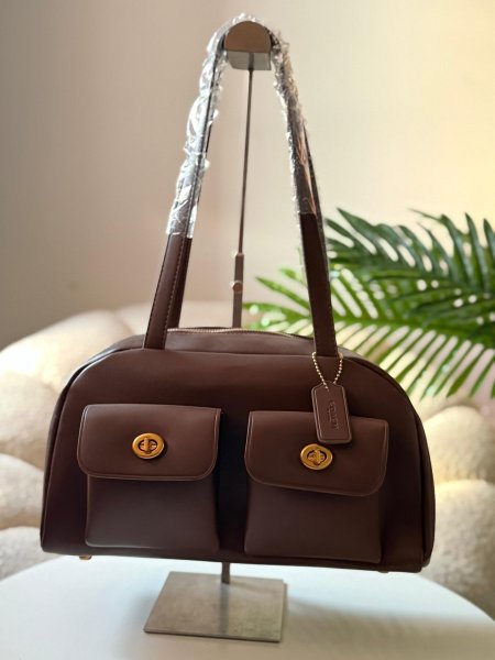 حقيبة كوتش لون بني محروق حجم كبير