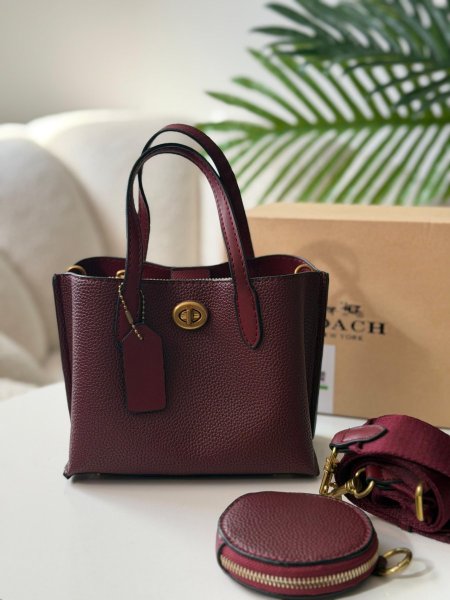 حقيبة كوتش لون برغندي