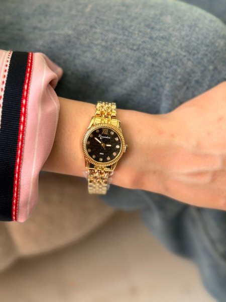 ساعة شبيه روليكس ارضية اسود الهاردوير ذهبي  اللون مكفول