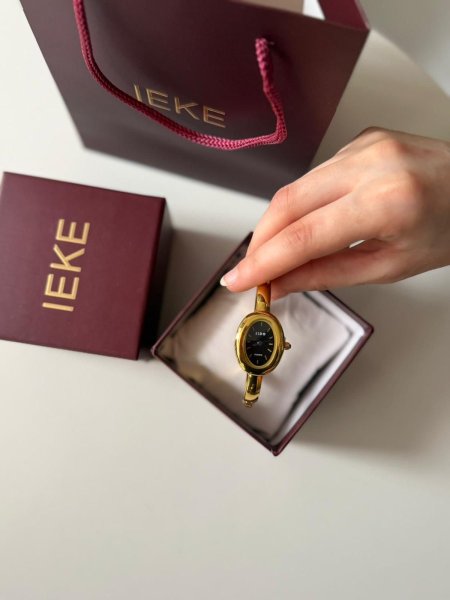 ساعة إيكي شبيه كارتير ارضية أسود هاردوير ذهبي  مكفول اللون